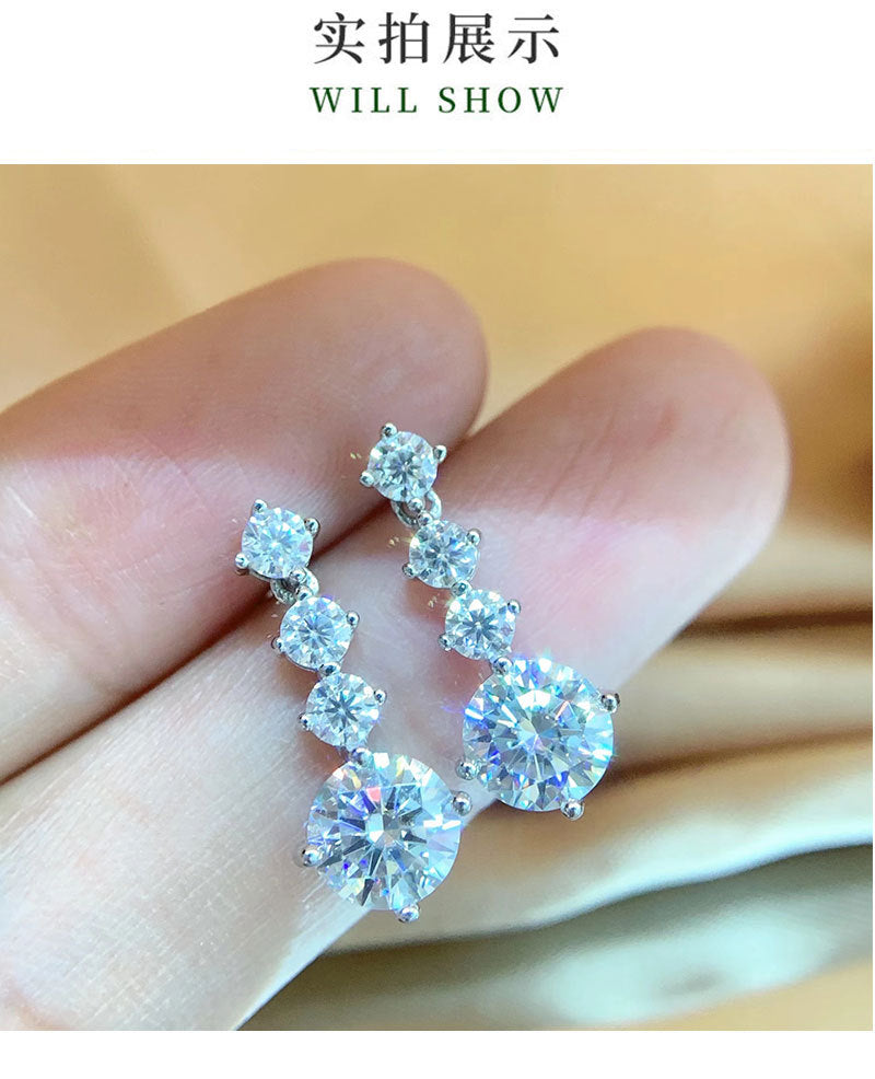 Moissanite earrings silver needle temperament heavy industry long S925 pure silver pulsating heart round summer style.