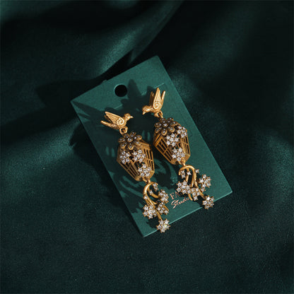 earrings  Three-dimensional hollow craft wind chime birdcage earrings literary retro earrings