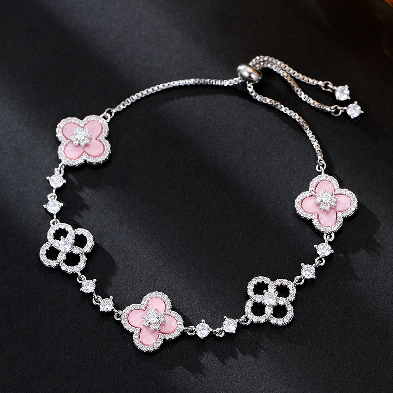 Light luxury micro inlaid zircon lucky grass shell bracelet with adjustable pull-out function, high-end exquisite mother shell bracelet bracelet and accessories