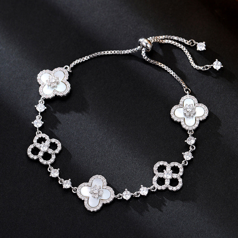 Light luxury micro inlaid zircon lucky grass shell bracelet with adjustable pull-out function, high-end exquisite mother shell bracelet bracelet and accessories