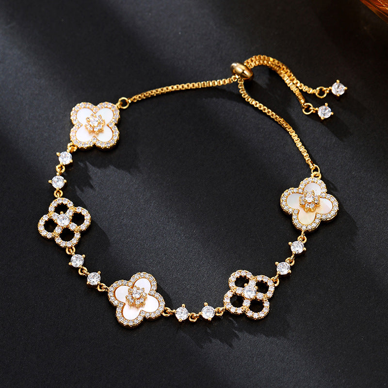 Light luxury micro inlaid zircon lucky grass shell bracelet with adjustable pull-out function, high-end exquisite mother shell bracelet bracelet and accessories