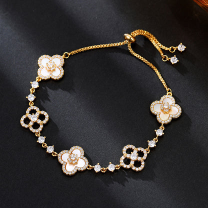 Light luxury micro inlaid zircon lucky grass shell bracelet with adjustable pull-out function, high-end exquisite mother shell bracelet bracelet and accessories