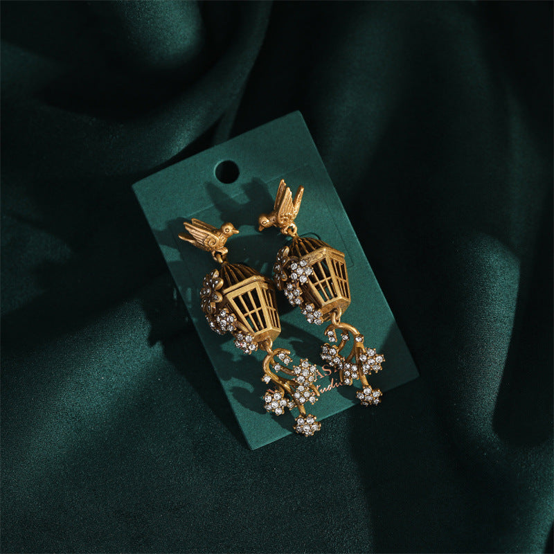 earrings  Three-dimensional hollow craft wind chime birdcage earrings literary retro earrings