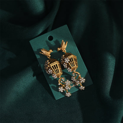 earrings  Three-dimensional hollow craft wind chime birdcage earrings literary retro earrings