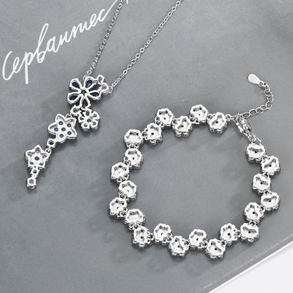 Jewelry set with earrings, bracelet, and collarbone chain for women