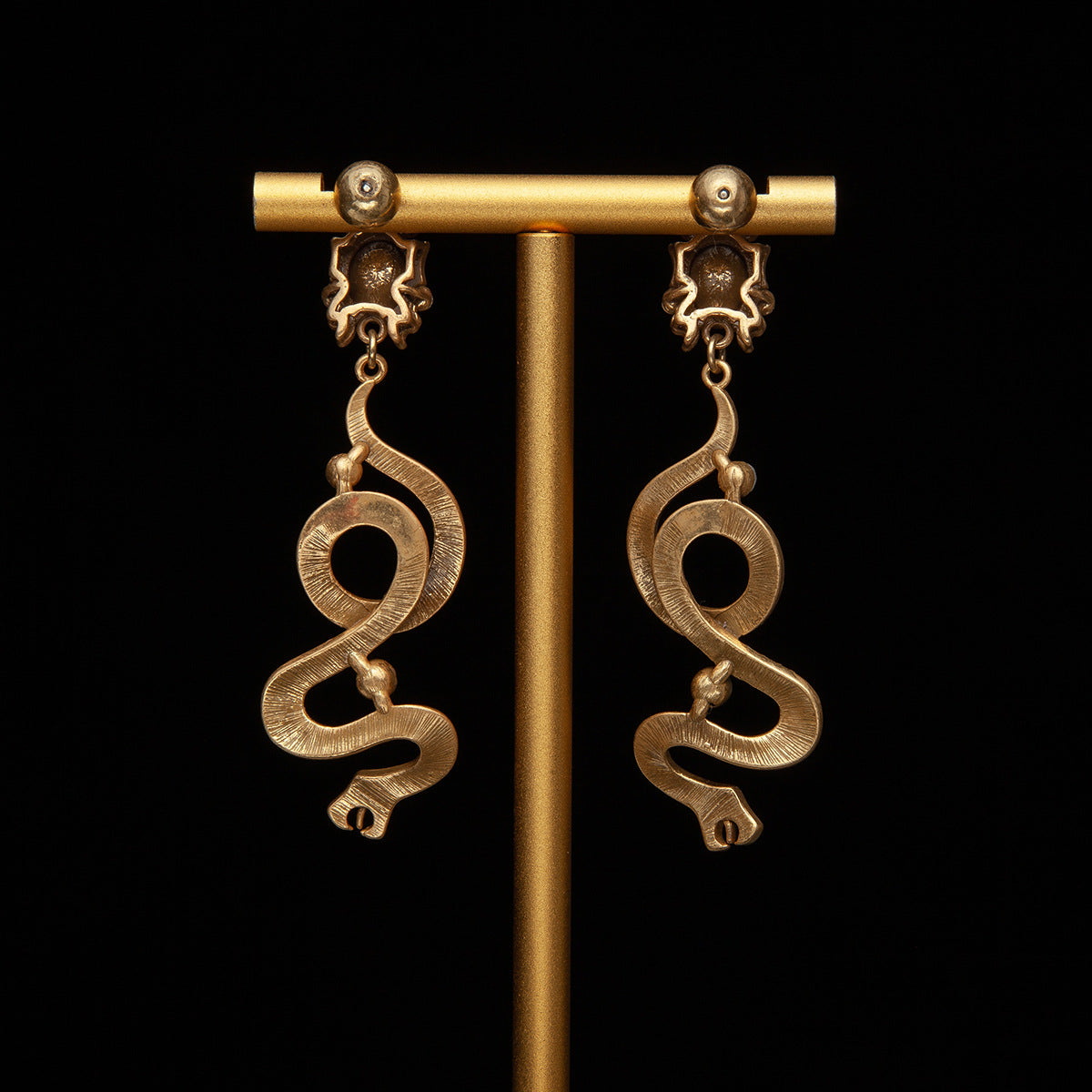 High sense of European and American style white snake-shaped earrings