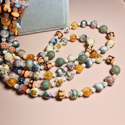 necklace  Orange diagonal hand-painted bead chain