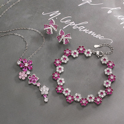 Jewelry set with earrings, bracelet, and collarbone chain for women