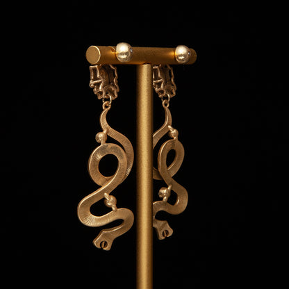 High sense of European and American style white snake-shaped earrings