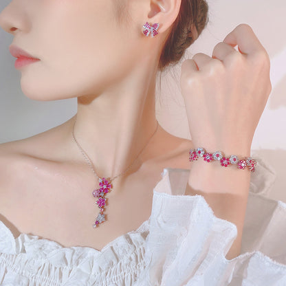 Jewelry set with earrings, bracelet, and collarbone chain for women