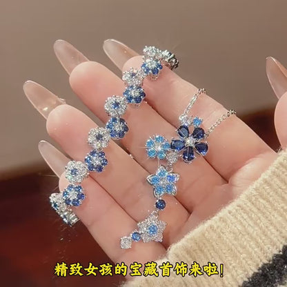 Jewelry set with earrings, bracelet, and collarbone chain for women